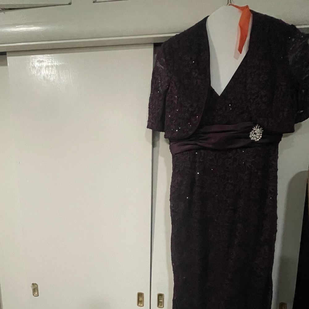 Two piece purple lace formal dress with rhinestone pin